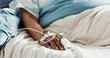 © N Felix/peopleimages.com - Iv drip, emergency and hand of patient in a hospital after surgery, treatment and operation in a clinic sleeping. Closeup, healthcare and person in medical ER for recovery, life support and medicine