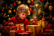 © Enrique - a child under the Christmas tree playing with the Christmas boxes and gifts