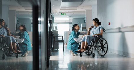 Wall Mural - Happy nurse, wheelchair patient and people talking, consulting and motivation advice, kindness or empathy for medical surgery. Support, client or doctor trust, care and chat to person with disability