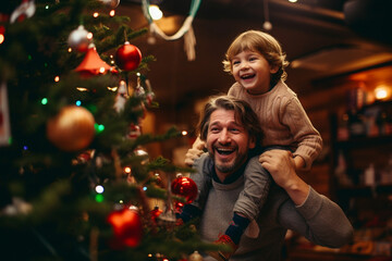 happy smiling father and son with Christmas tree family have fun and celebrating Christmas