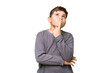 © luismolinero - Little caucasian kid over isolated chroma key background having doubts while looking up