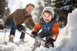 © RJ.RJ. Wave - happy smiling parent and child clearing snow by shovel after snowfall , love winter