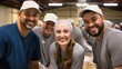 © Meow Creations - Portrait of a group of happy workers standing together in a warehouse