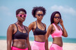 © larrui - Empowered and Fit: Young Black Athletes Training on the Beach, ai generative