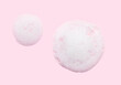 Skincare cleanser foam texture with bubbles isolated on pastel pink background. Soap shampoo face wash cleansing musse product sample