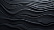 A black, textured wall, with a subtle pattern of swirls and lines