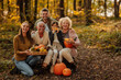 © bernardbodo - Portrait of a big happy family in the forest in fall