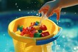 A child's hand is pouring water into a yellow bucket filled . This versatile image can be used to depict creativity, playtime, or educational activities.