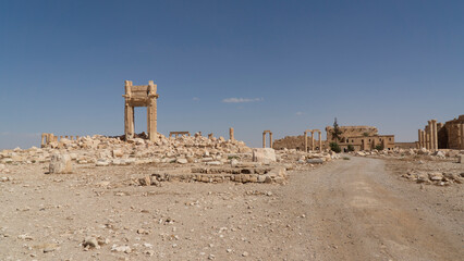 Wall Mural - Bel's temple entrance arch remains at Palmyra, Syria