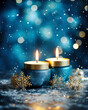 Christmas blue candles and golden snowflakes, new year burning candle on magic bokeh background with copy space. Winter holidays festive greeting card.