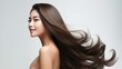 © PixelPaletteArt - Asian young woman posing in front of white background with her hair waving
