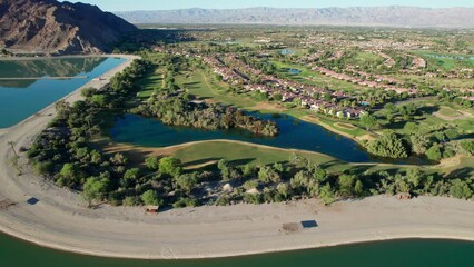 Wall Mural - Aerial view of Lake Cahuilla, the mountains and desert communities 