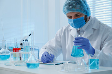 Poster - Scientist working with sample in laboratory. Medical research