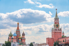 Intercession Cathedral Or St. Basil's Cathedral And The Spassky Tower Of Moscow Kremlin At Red Square In Moscow, Russia