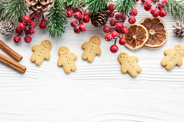 Wall Mural - Christmas gifts, gingerbread cookies, decorations with christmas tree.