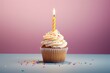 Delicious cupcake with tempting icing and colorful candle. Generative AI