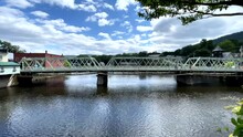 Families Walk Across Rail Bridge In Shelburne Falls Massachusetts On Beautiful Summer Day