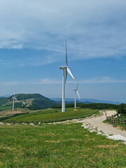 Canvas Print - This is a hill with a wind turbine.
