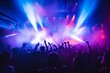 © Viewvie - Rear view of  the crowd of people at a party at a concert stage at a music festival