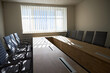 Sunlit Conference Room with Empty Seating