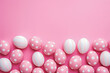 Above top view of pink colored painted easter eggs. Easter background with spring flowers and eggs. Celebrating easter holidays.
