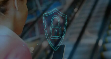 Poster - Animation of dots forming padlock in shield, caucasian woman scrolling on cellphone near escalator