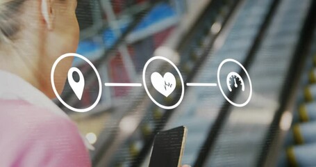 Poster - Animation of flowchart of icons over caucasian woman scrolling on cellphone while using escalator