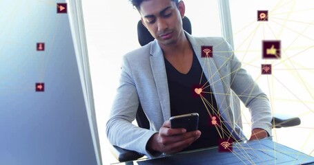 Poster - Animation of connected icons globes over biracial man sitting on chair and using cellphone at office