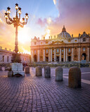 Fototapeta  - Vatican City Holy( See. Rome, Italy. Dome of St. Peters Basil cathedral at Saint Square. Evening sunset, golden hour with evening sky and street lamps