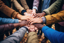 Group Of Mix Race People Joining Hands Together In A Circle Supporting Each Other, Symbolizing Unity And Collective Action In The Fight Against Social Injustice
