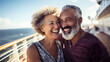 Happy senior mixed race couple on the deck of a cruise ship in the mediterranean
