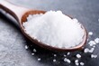 close-up of a spoonful of iodized salt, a key mineral for thyroid health