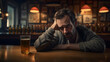 Drunk desperate depressed sad man sitting in a bar drinking hard liquor