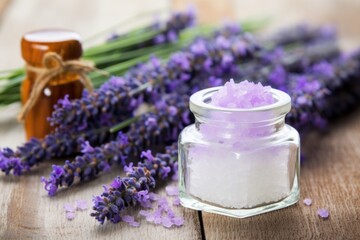 Wall Mural - sea salt in a glass jar next to lavender flowers