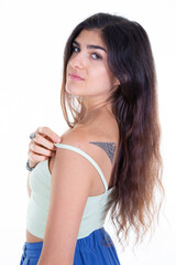 Wall Mural - tattooed woman young beautiful girl portrait with long hair over white studio shot