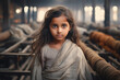 Cute indian poor little girl standing alone