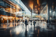 © akualip - Business people walking in the office with blur motion