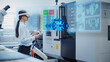 © Gorodenkoff - Professional Research and Development Specialist Wearing Virtual Reality Headset, Managing Settings on an Industrial Machine at a Factory Facility. Digital Hologram Showing Mechanism in Action