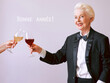 stylish senior sommelier woman in tuxedo with glass or red wine at the party. Beverage, mature, style, friendship concept 
