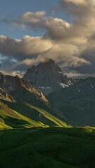 Wall Mural - beautiful sunset in mountains and clouds, caucasus, russia, zoom in timelapse. vertical video