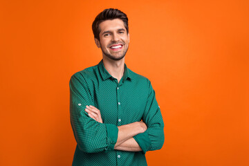 Aufkleber - Portrait of businessman confident company owner wear green formal shirt folded arms best sales manager isolated on green color background