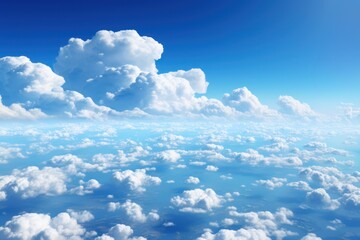 Wall Mural - Blue sky and clouds, aerial view of planet Earth curvature, sunny day
