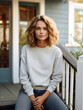 Sweatshirt mockup one woman girl in a gray crewneck sitting on the porch of her house