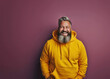 © paloma - Man smiling cheerful fun happy cool white bearded man he wear yellow sweater casual clothes looking camera isolated on plain pink pastel wall background studio portrait. Lifestyle concept.