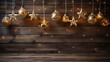Weihnachtliche Deko mit goldenen  Sternen auf braunem Holz-Hintergrund