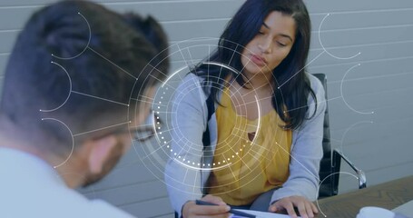 Poster - Animation of round scanner against diverse man and woman discussing over a document at office