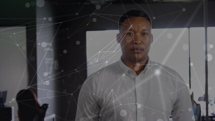 Poster - Animation of network of connections against portrait of african american man smiling at office