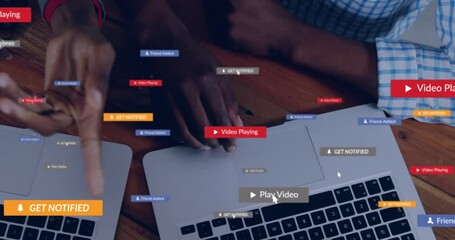 Poster - Animation of social media icons against mid section of colleagues discussing over laptop at office