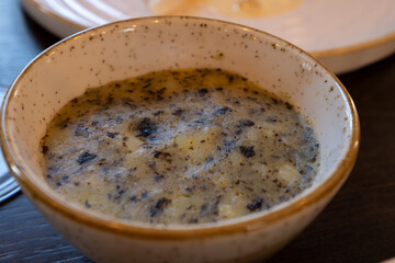 Wall Mural - Side dish in restaurant in France, farm mashed potatoes cooked with green dried nori seaweed