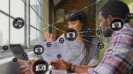 Poster - Animation of network of connections with icons over diverse business people in office